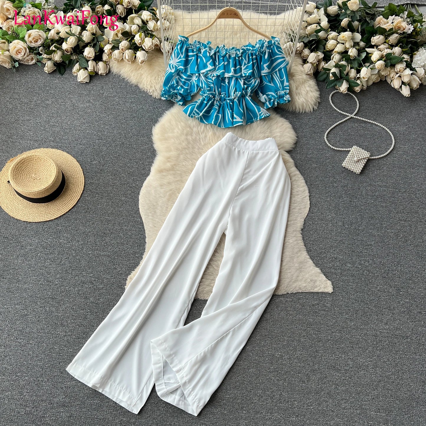 LKF Summer Casual One Piece Shoulder Lotus Leaf Edge Fragmented Flower Shirt Top Women's Wide Leg Pants Two Piece Set Wholesale